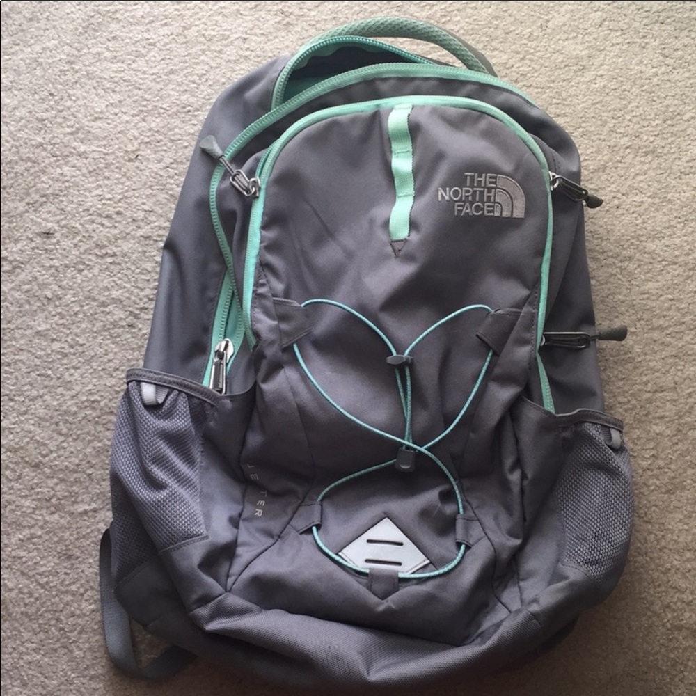 Mint and gray north face backpack
